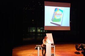 <p>Michelle Provoost, Director of INTI, introduces the night's themes and INTI's interest in eco-cities.</p>